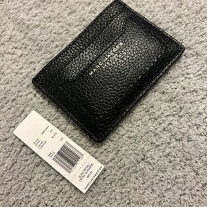 SOLD ON MERCARI Marc Jacobs 3 slot card wallet 
Color: Black